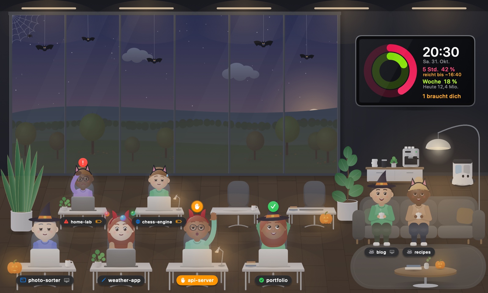 Halloween in the office: pumpkins, paper bats and characters in costume, German interface.