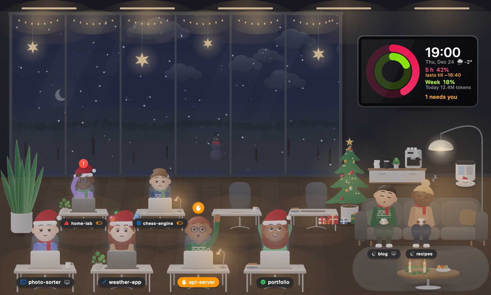 Christmas Eve in the office: tree, string lights, presents and Santa hats.